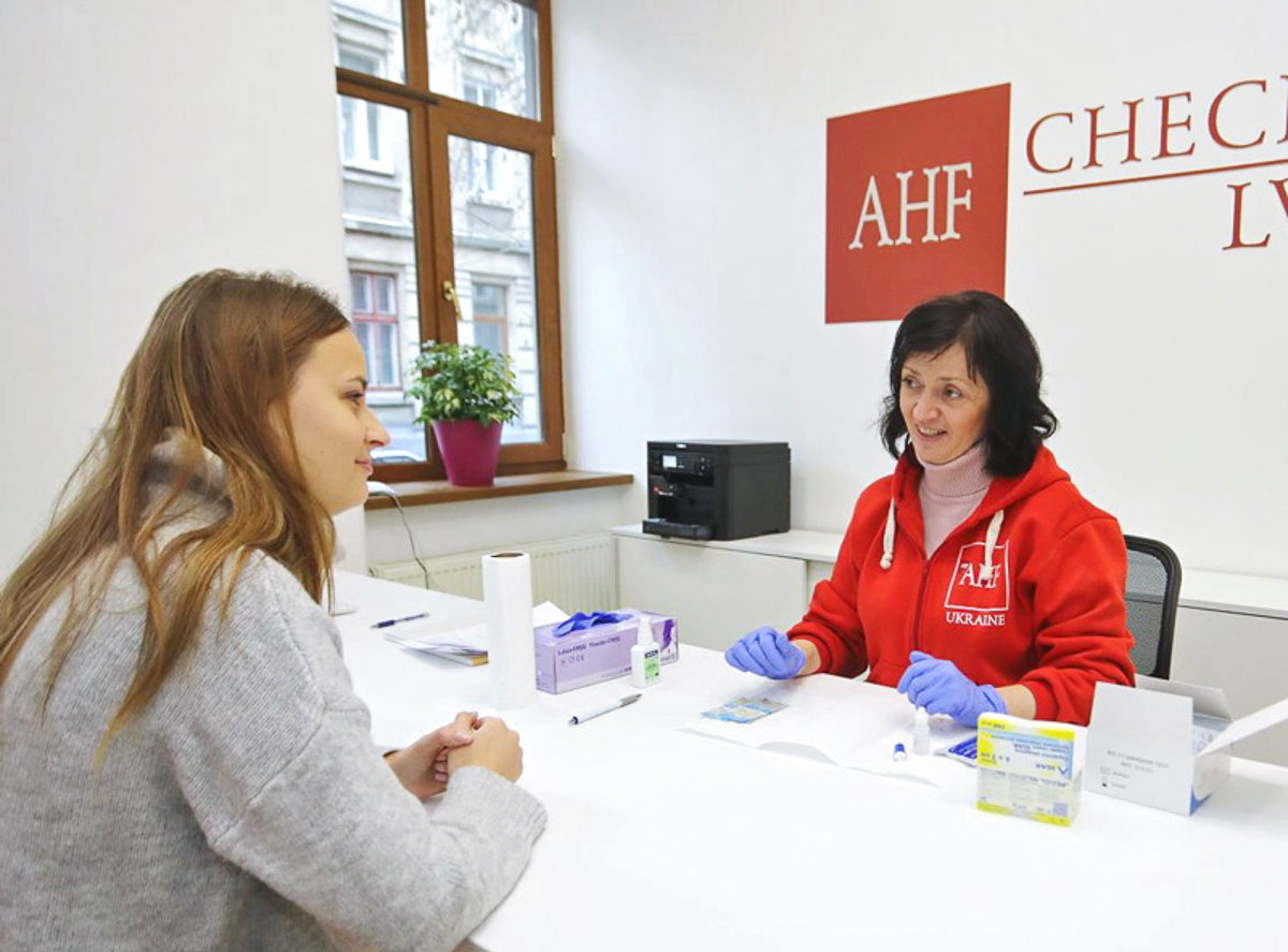 Woman getting a rapid HIV test in Lviv and Kyiv
